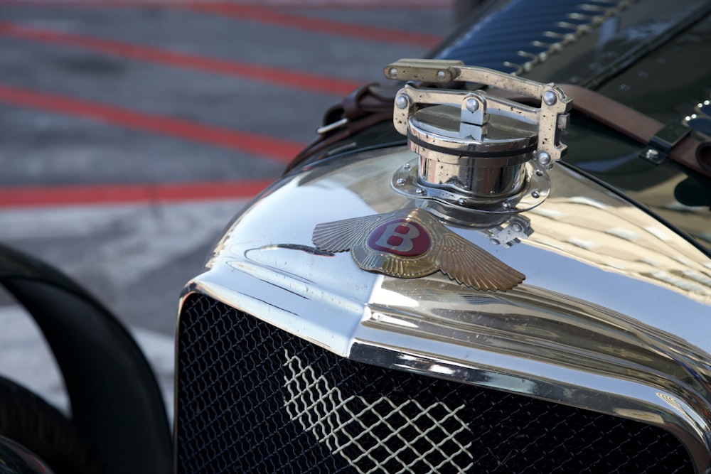 a close up of the front of a classic car