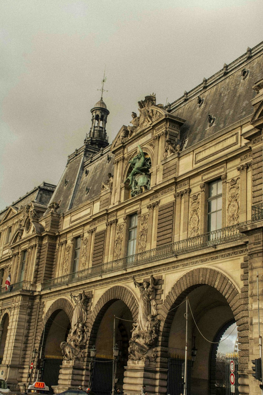 a large building with a clock on the top of it