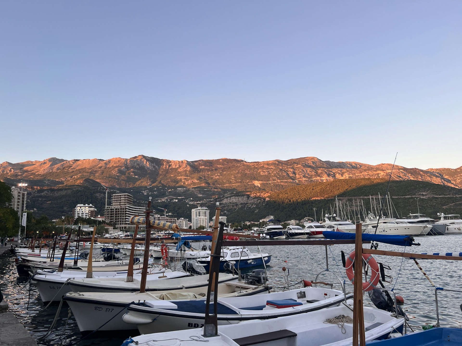 woman wearing yellow long-sleeved dress under white clouds and blue sky during daytime
