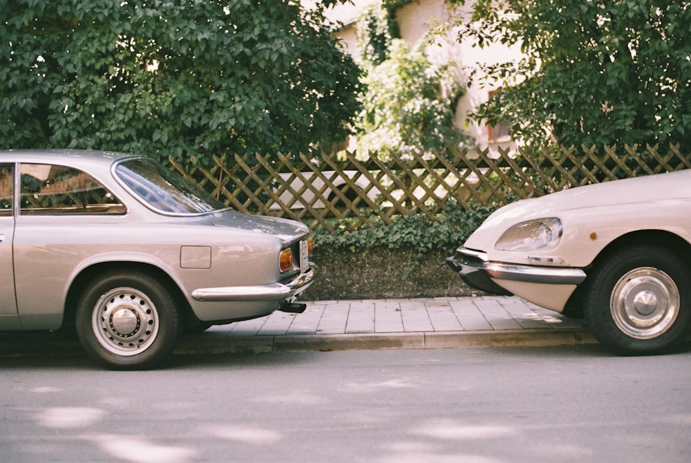 a couple of cars parked next to each other