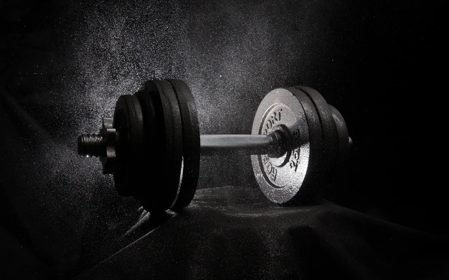 Black and white close-up of a dumbbell on the gym floor
