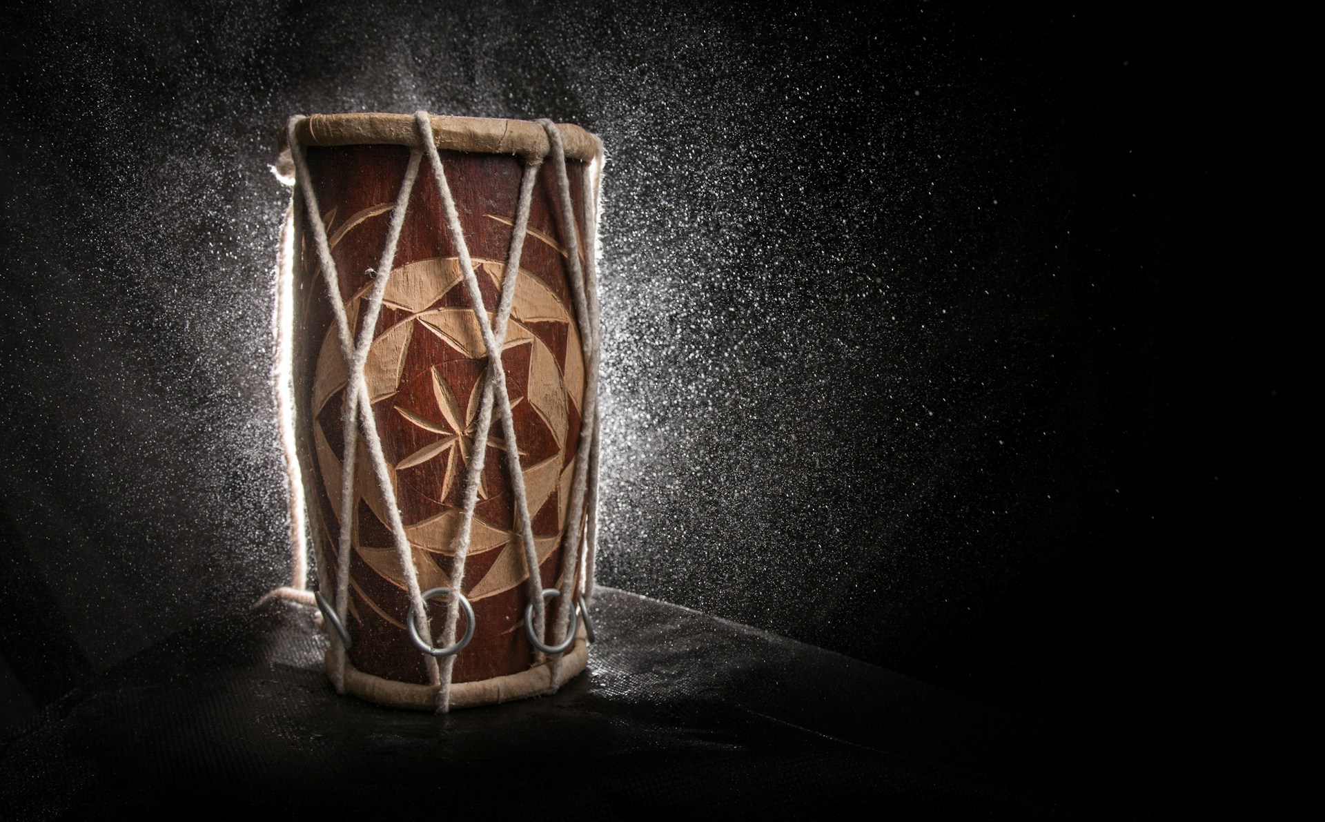 a drum is being sprinkled with water