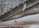 Close-up of the wooden texture and craftsmanship of a wendy house designed to withstand local weather.