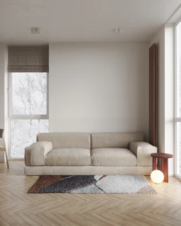a living room with a couch and a table