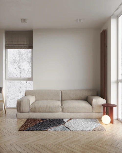 a living room with a couch and a table