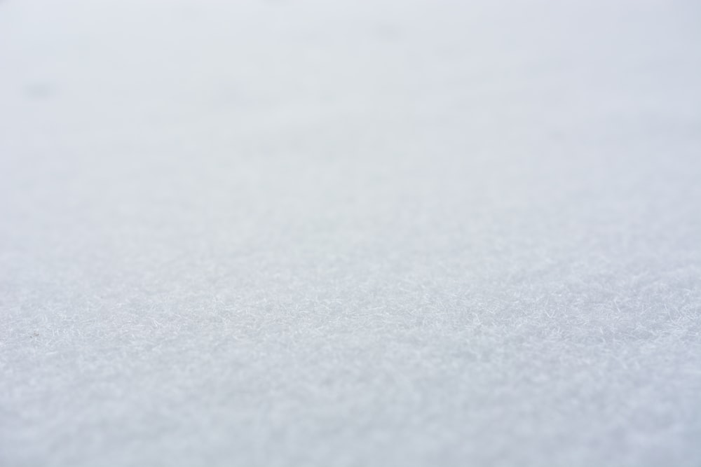 a close up of a snow covered ground