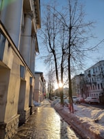 Sunlight reflecting off clean sidewalks in City Centre Coquitlam after a snowfall.