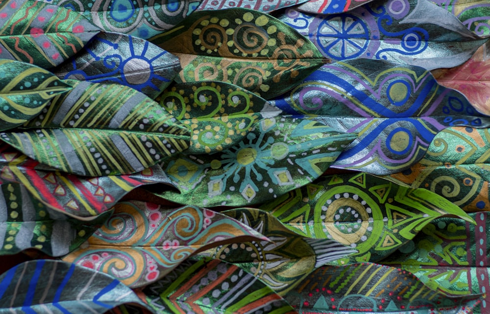 a close up of a pile of colorful cloths