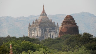 A panoramic view of the temple complex nestled among lush greenery in Thrissur district.