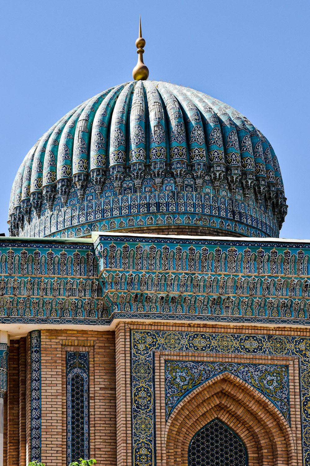 a large building with a blue dome on top of it