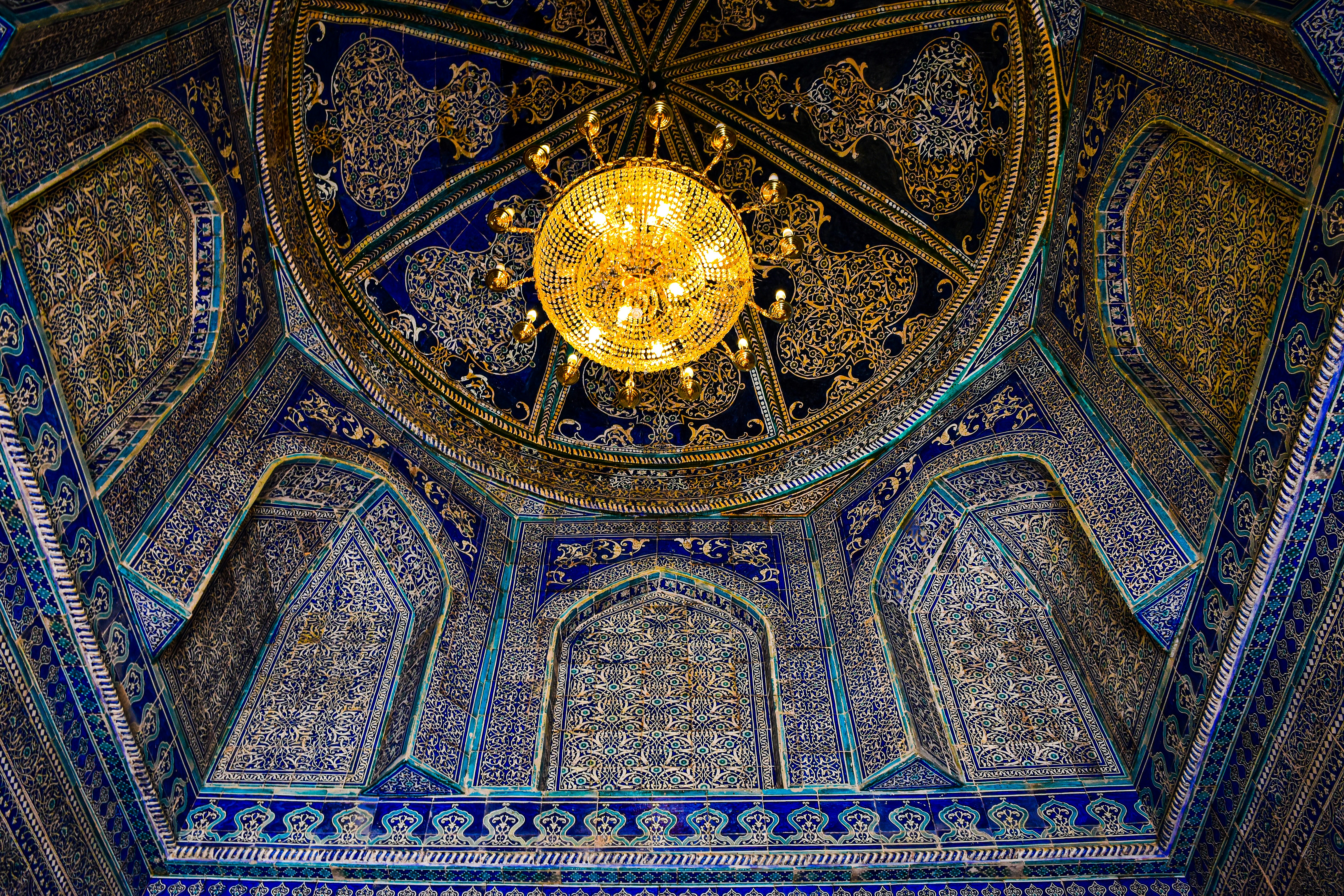 a dome with a chandelier in the middle of it, Khiva, Uzbekistan.
