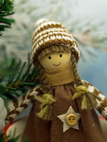 Freshly crafted amigurumi dolls dressed in cozy sweaters ready for gifting.