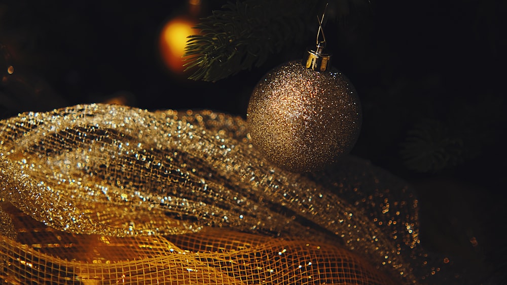 a christmas ornament hanging from a christmas tree