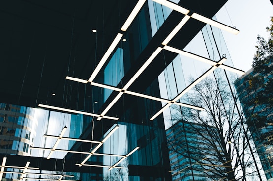 a group of lights hanging from the ceiling of a building