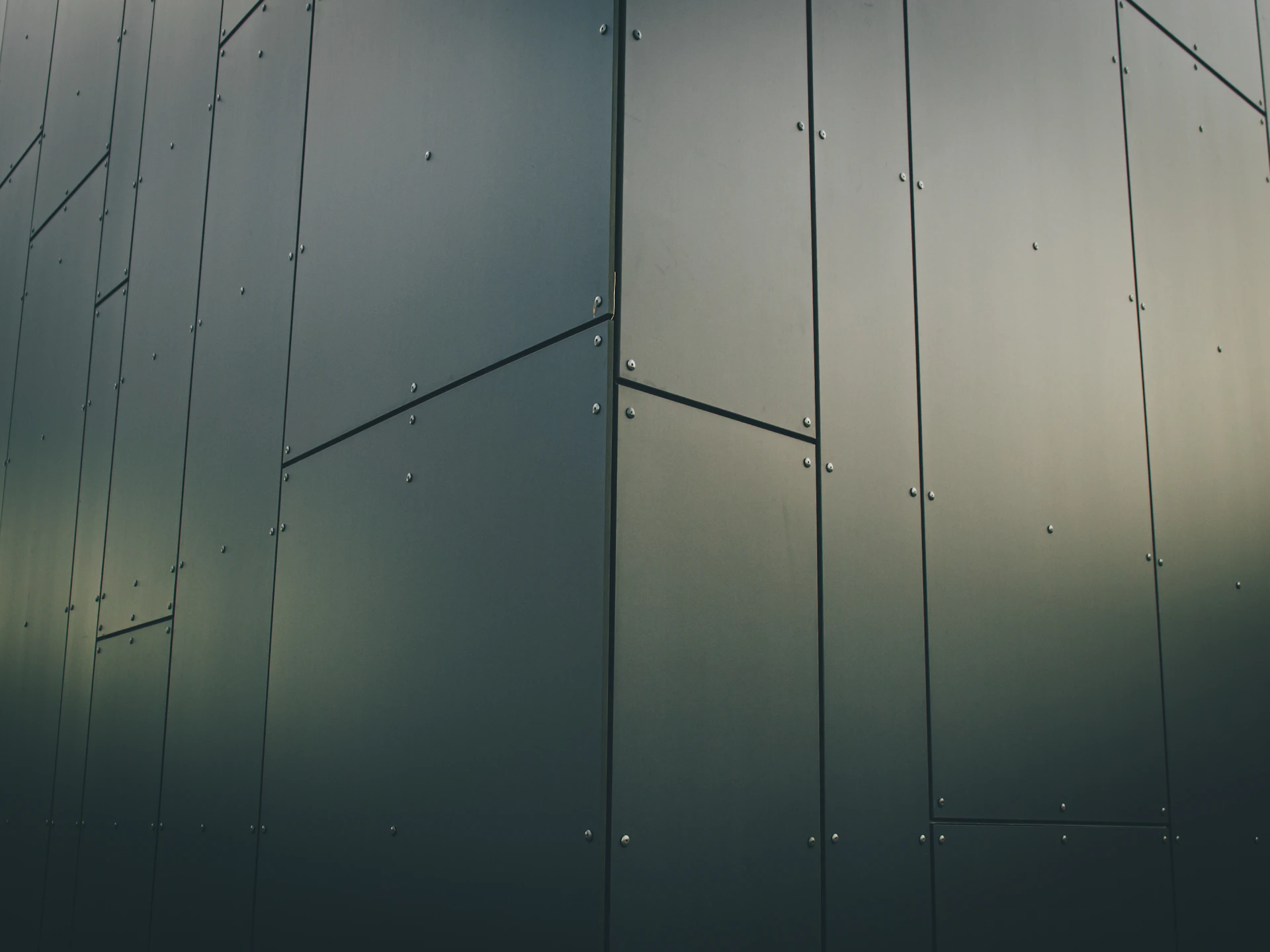 a close up of a building with a sky background
