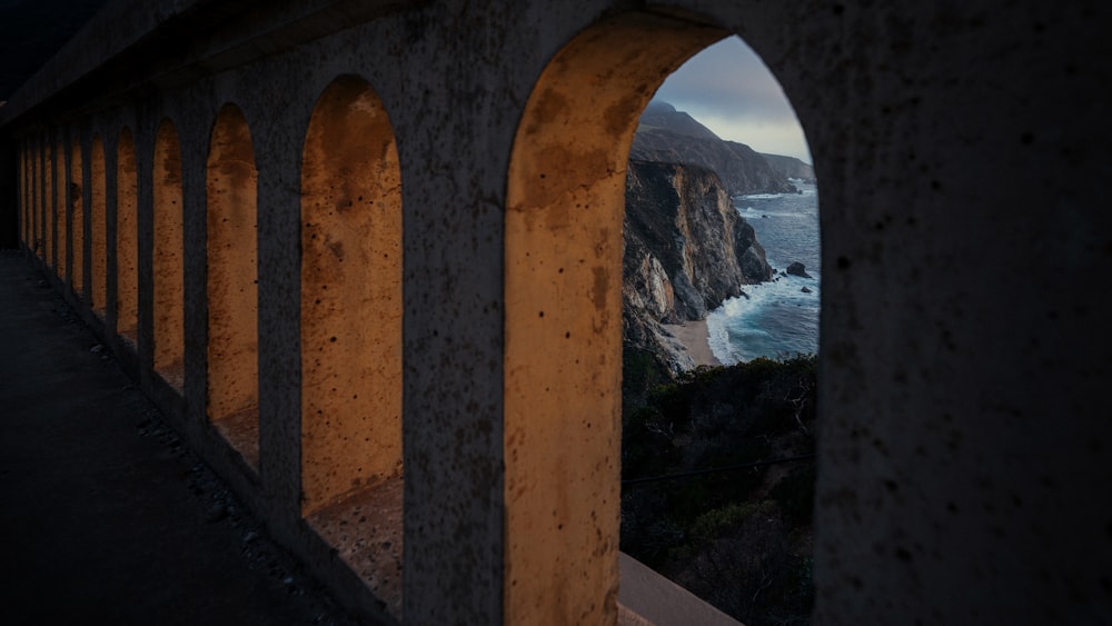 a view of a body of water from a bridge