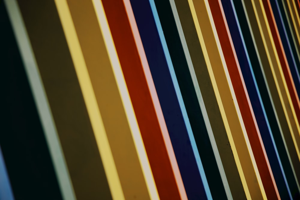 a row of multicolored lines on a wall