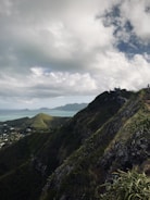 A vibrant photo of travelers enjoying a scenic mountain view in Indonesia.