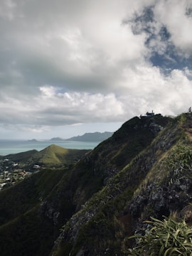 A vibrant photo of travelers enjoying a scenic mountain view in Indonesia.