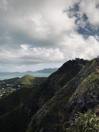 A vibrant photo of travelers enjoying a scenic mountain view in the Asia-Pacific region.