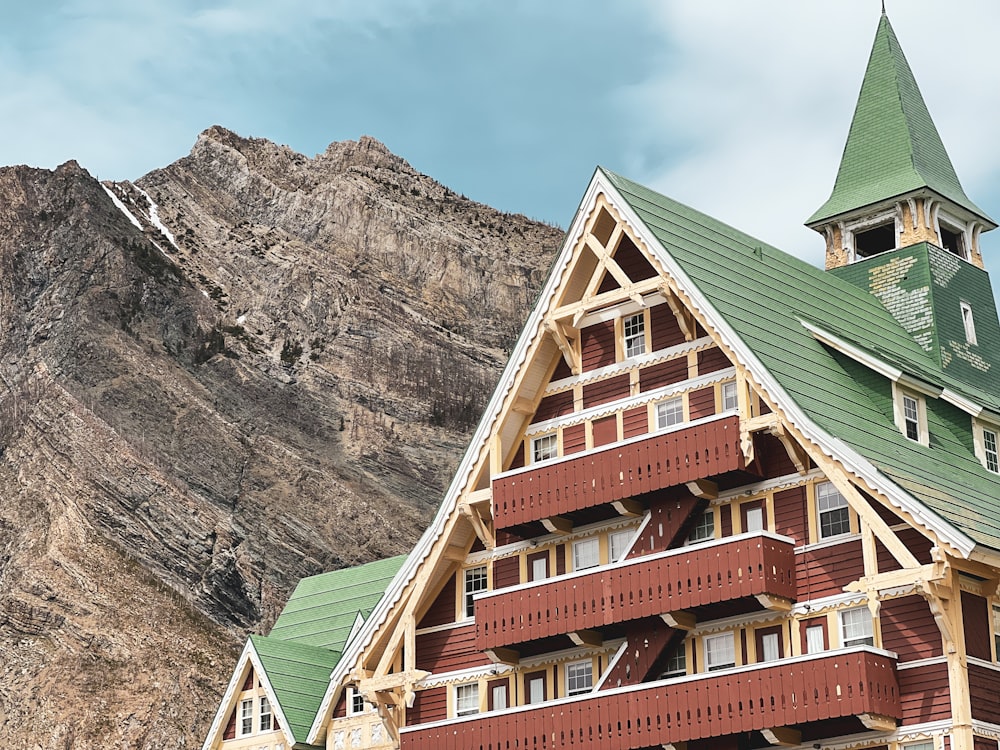 a building with a green roof and a steeple