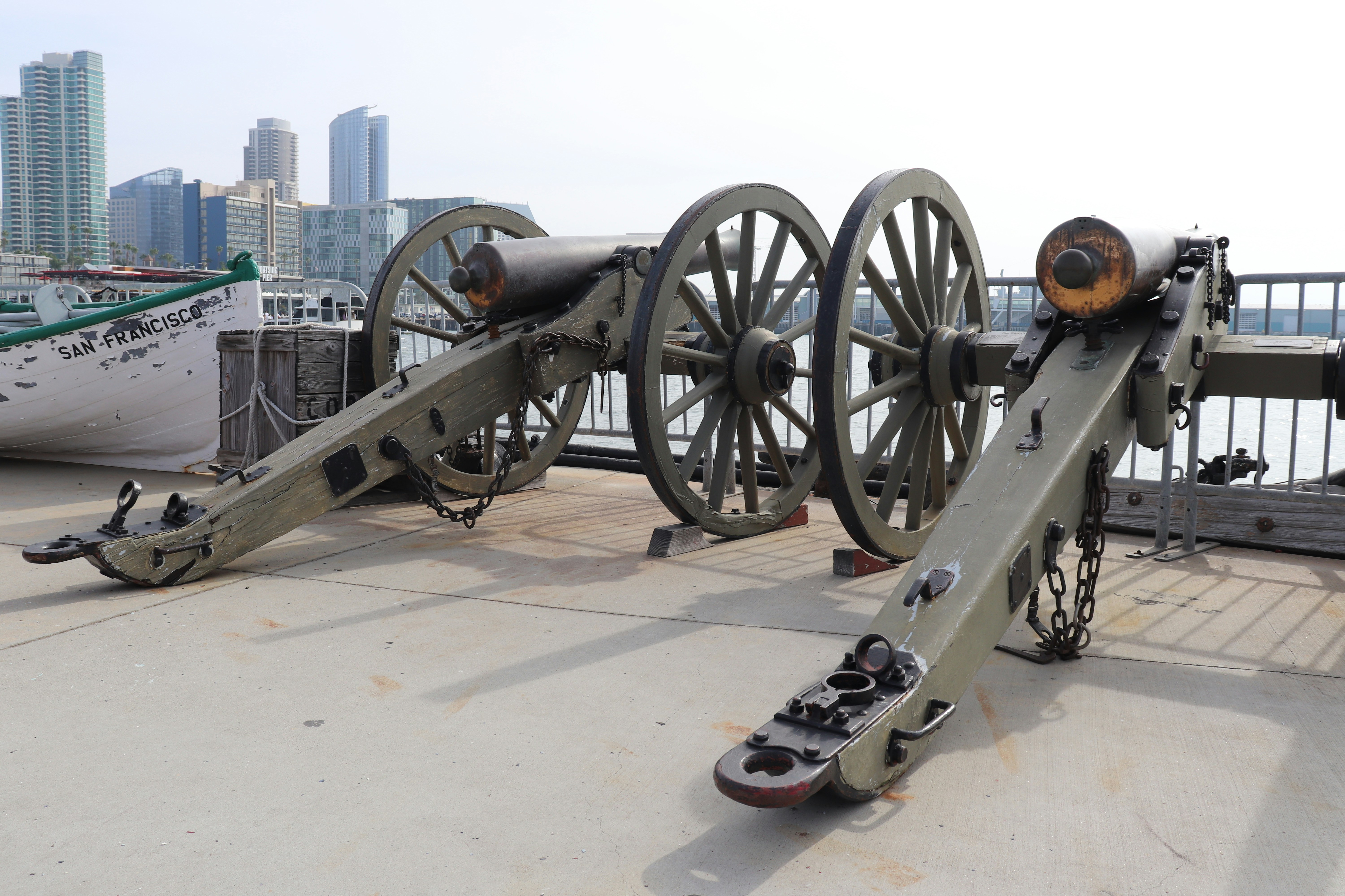 a pair of skis sitting next to a cannon
