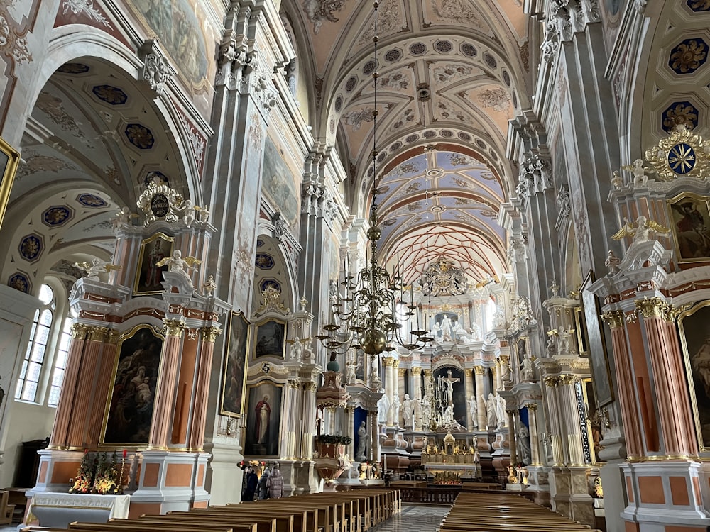 a large cathedral with high ceilings and a chandelier