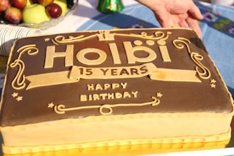 A beautifully decorated cake for a 15th birthday celebration.