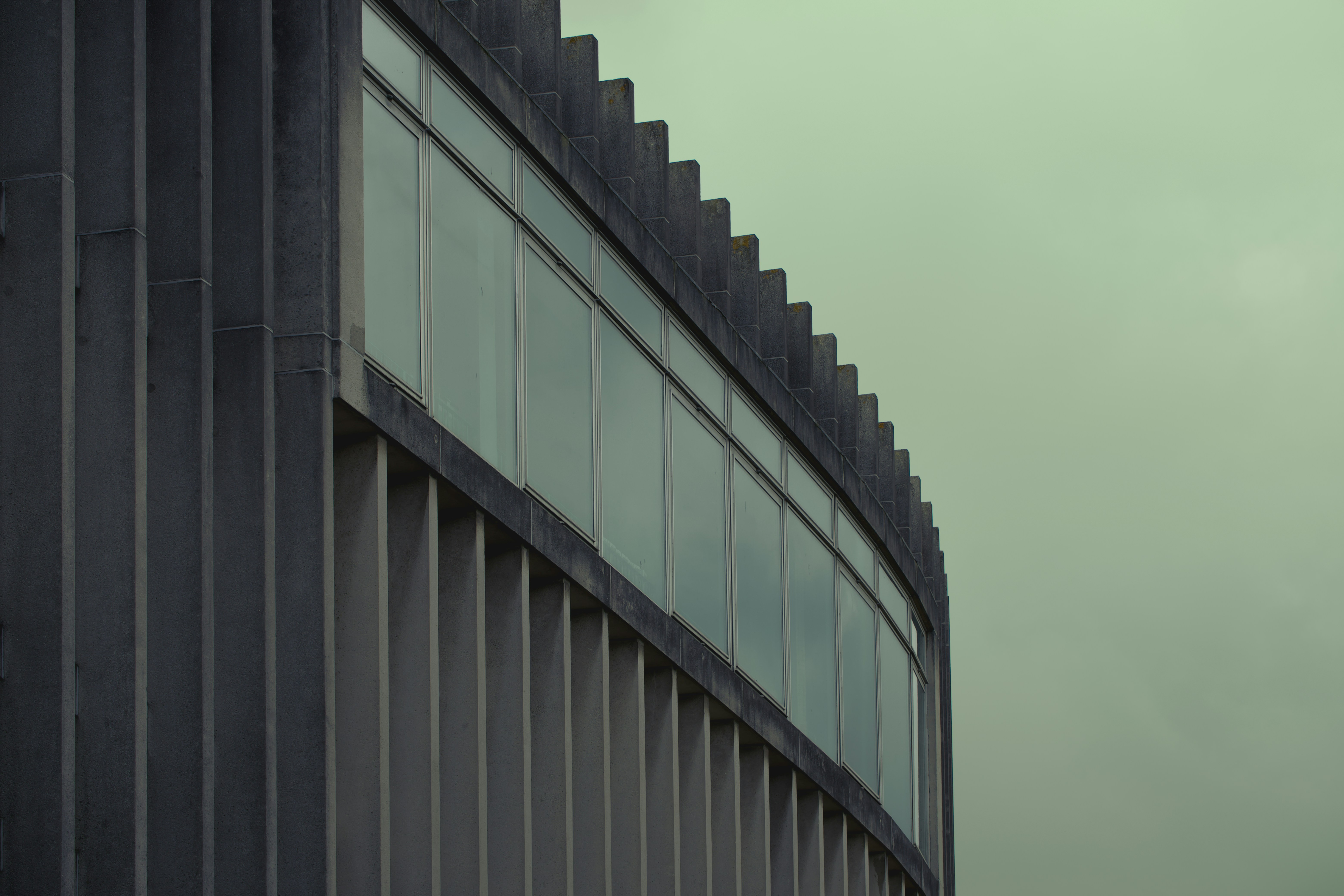 a tall building with lots of windows on top of it