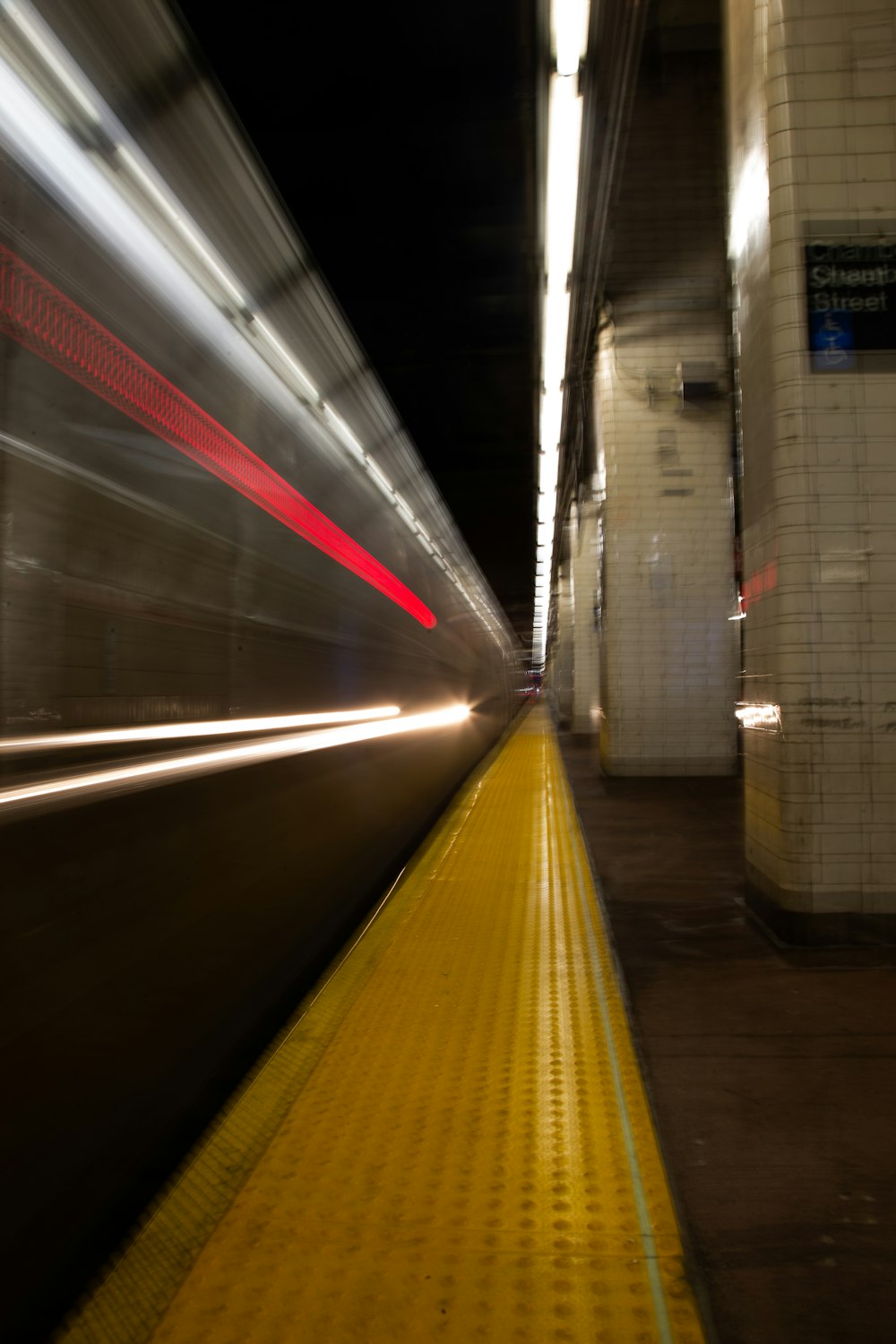 a blurry photo of a train going by