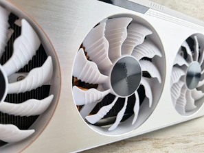 Close-up of a high-performance graphics card with intricate cooling fans