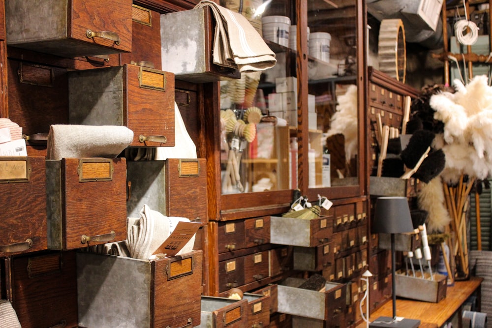 a room filled with lots of wooden drawers