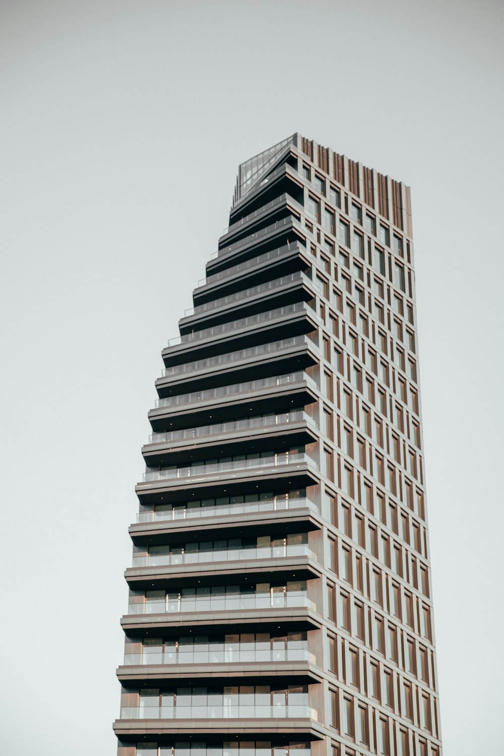 a tall building with a clock on the top of it