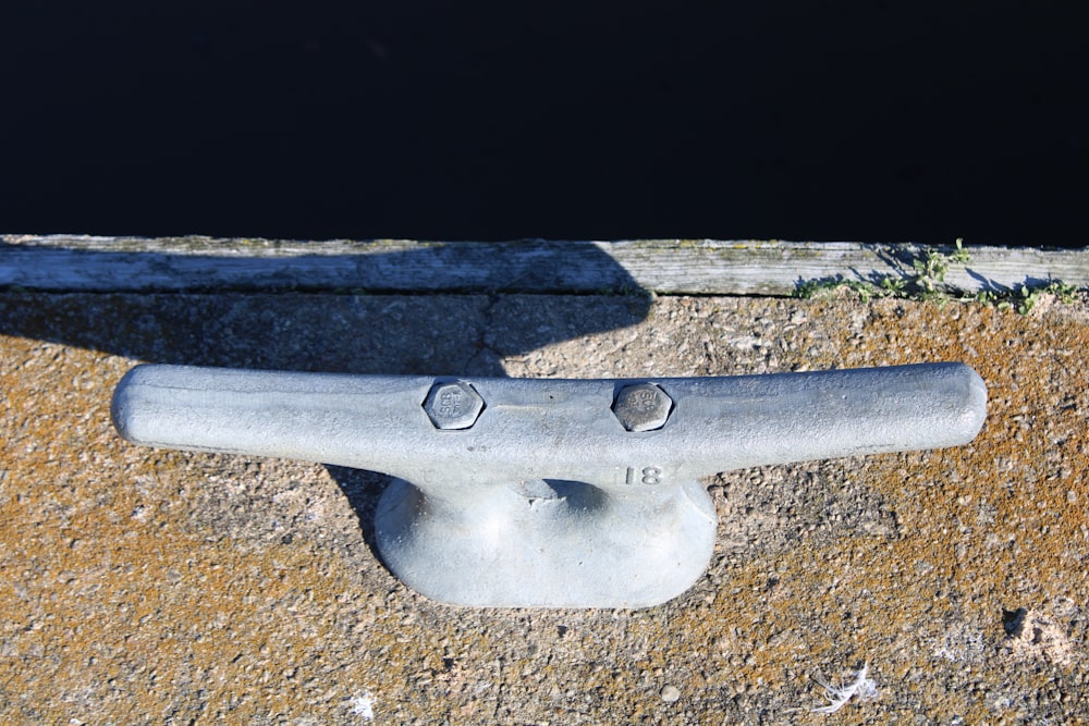 a close up of a metal object on the ground