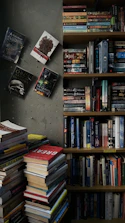 Rows of bookshelves filled with diverse books in a cozy reading area.