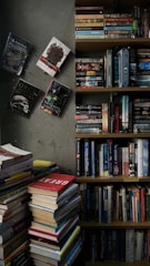 Stacks of diverse sheet music books in a cozy library corner.