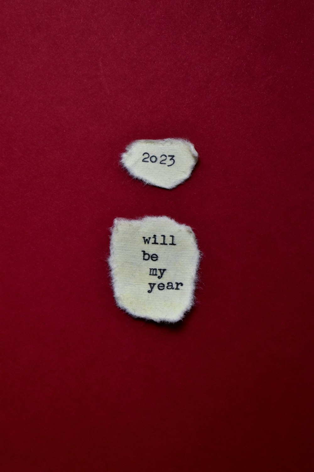 two pieces of torn paper with the words will by year written on them