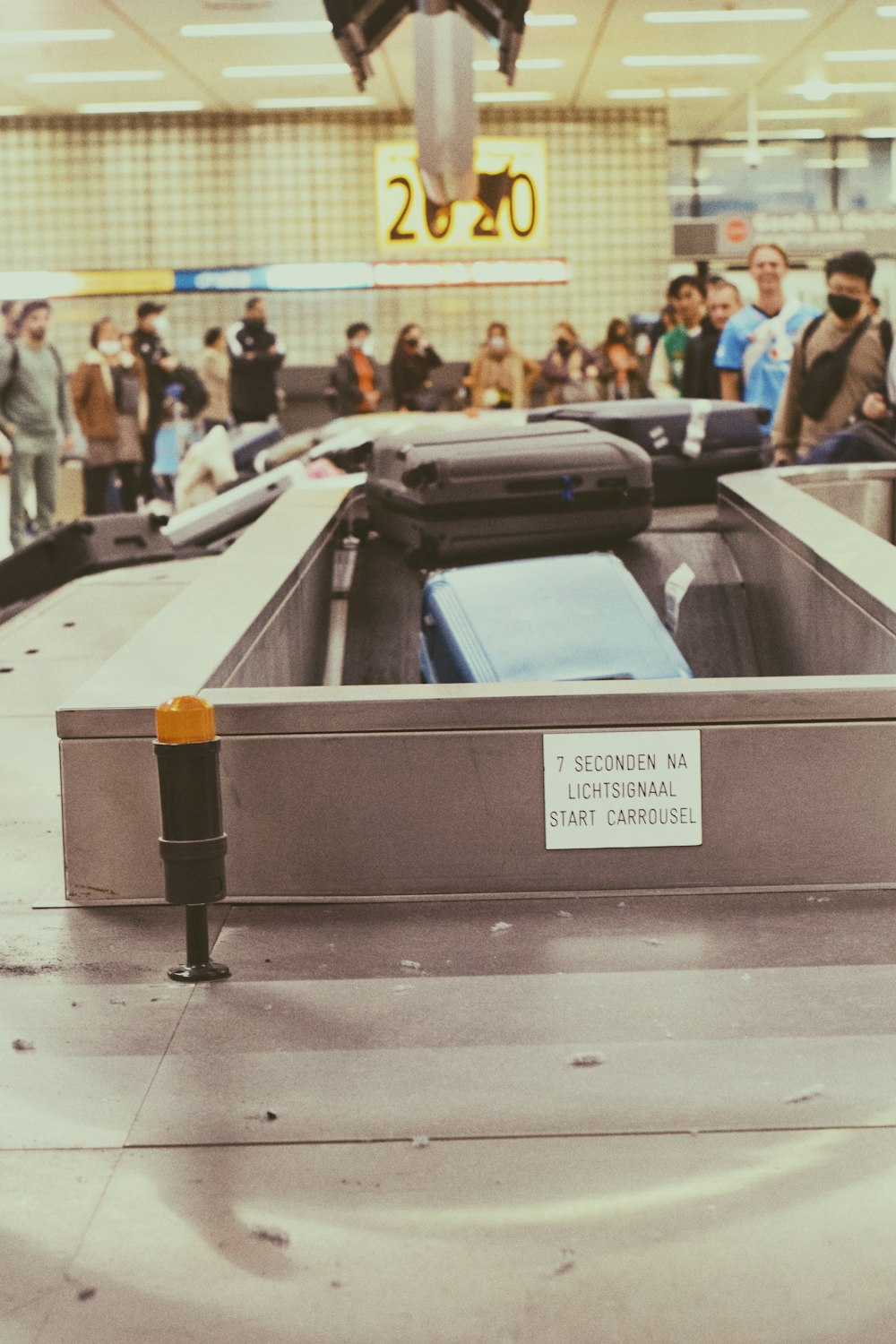 a conveyor belt with luggage on top of it