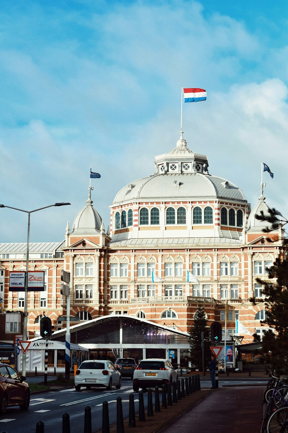 a large building with a flag on top of it