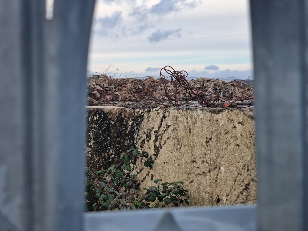 a view of a pile of debris through a window