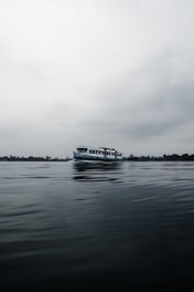 a large boat floating on top of a large body of water