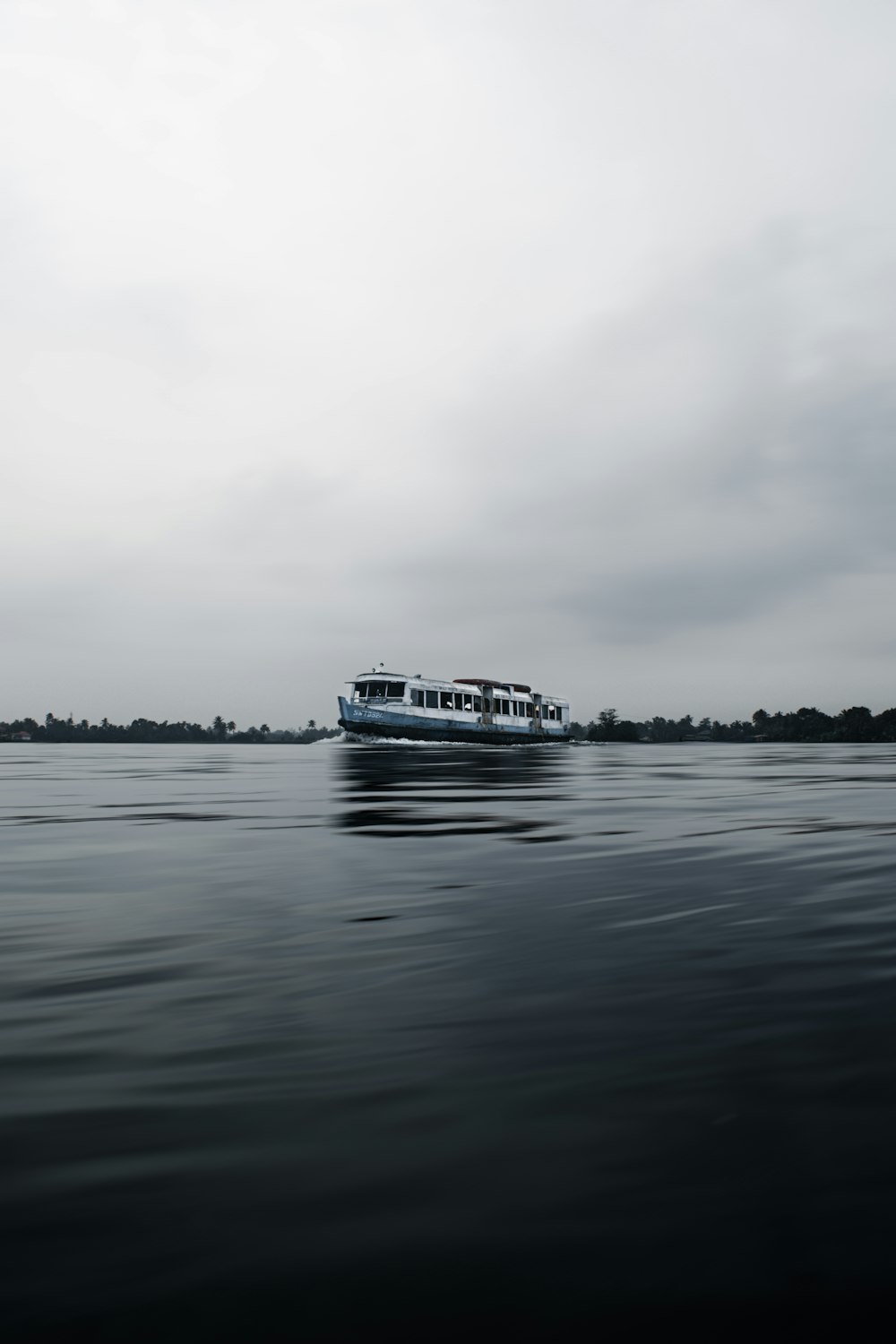 a large boat floating on top of a large body of water