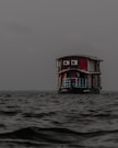 a boat floating on top of a body of water