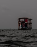a boat floating on top of a body of water