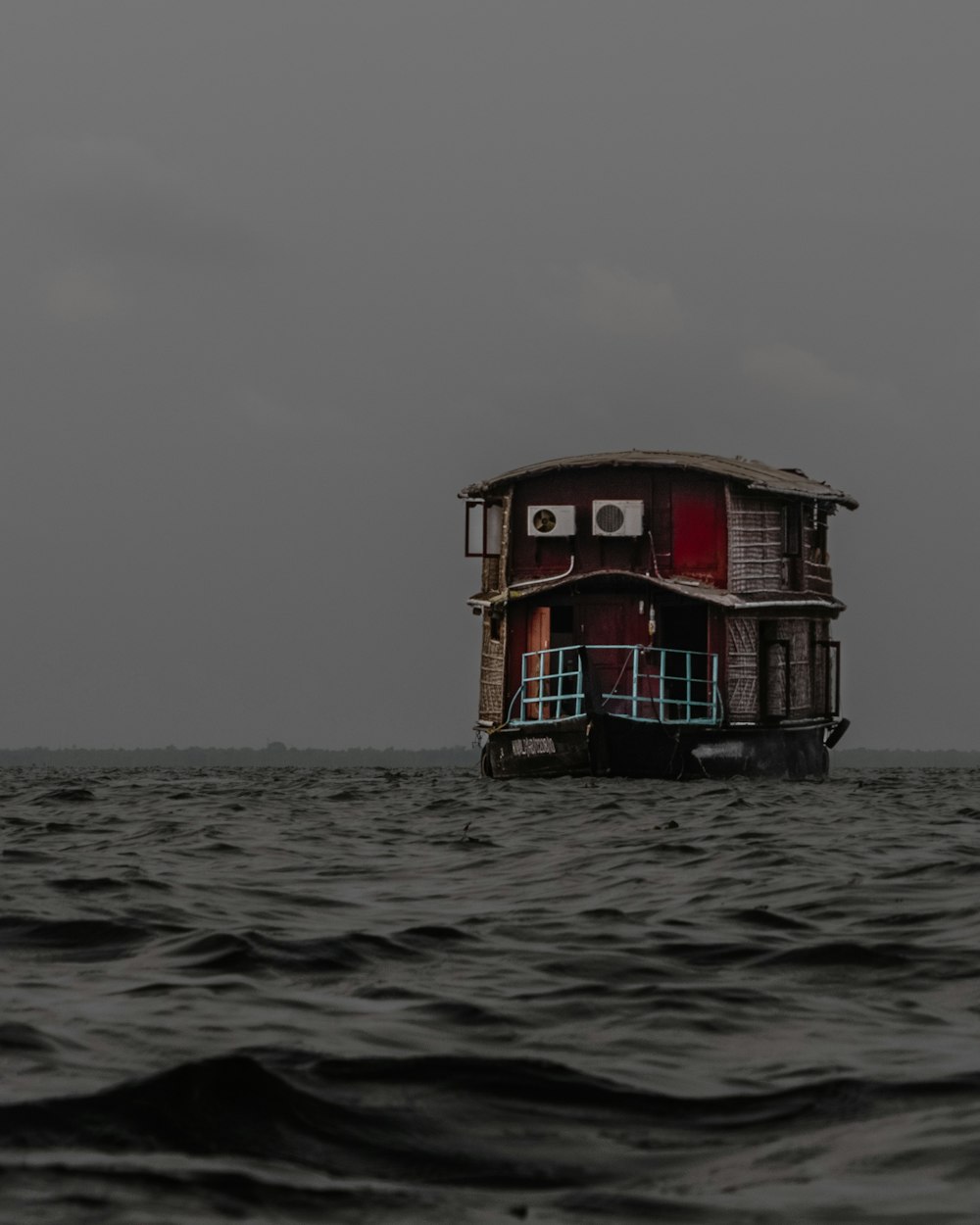 a boat floating on top of a body of water