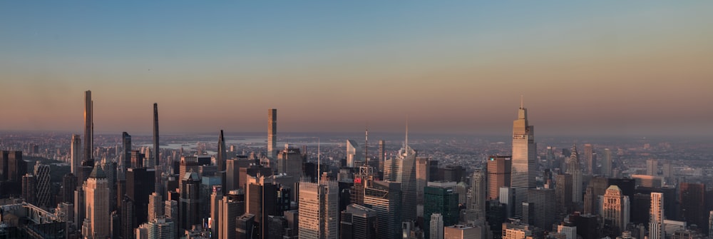 a view of a large city with tall buildings