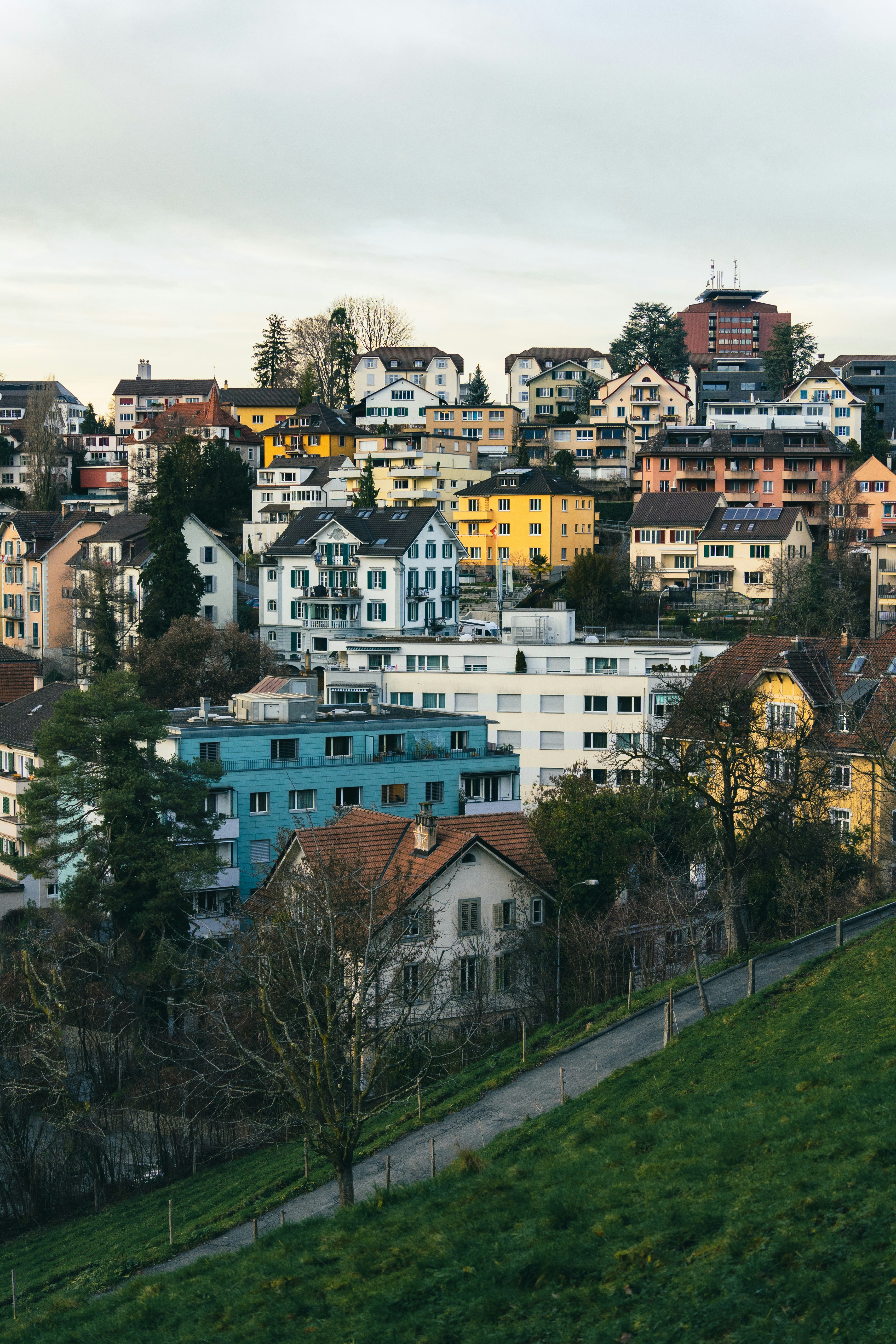 a view of a city from a hill