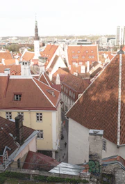 Scenic view of a historic European city with cobblestone streets and charming architecture.