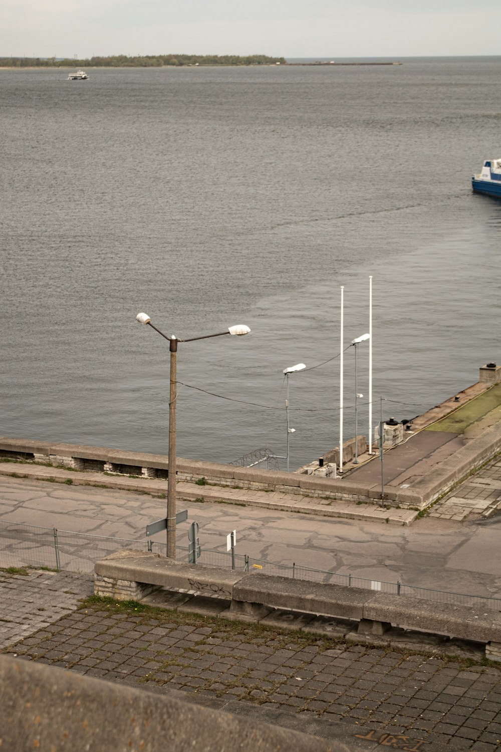 a large body of water with a boat in it