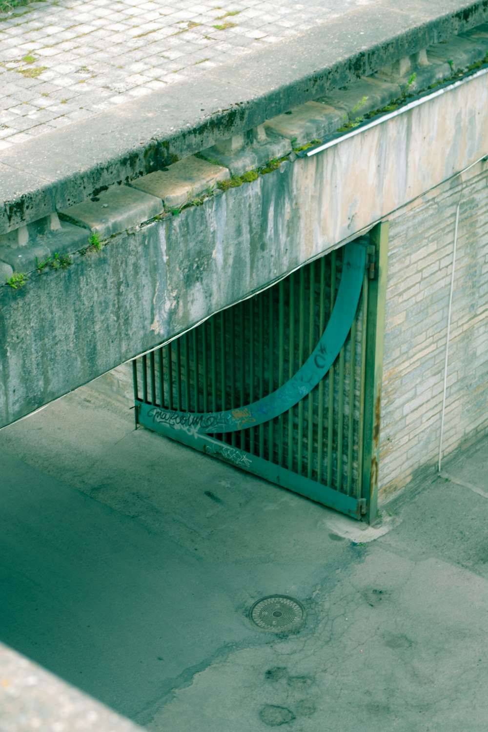 an overhead view of a building with a gate